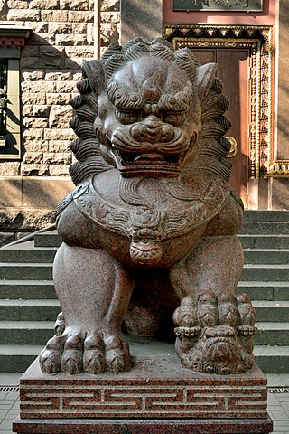 Shih Tzu statue outside a temple